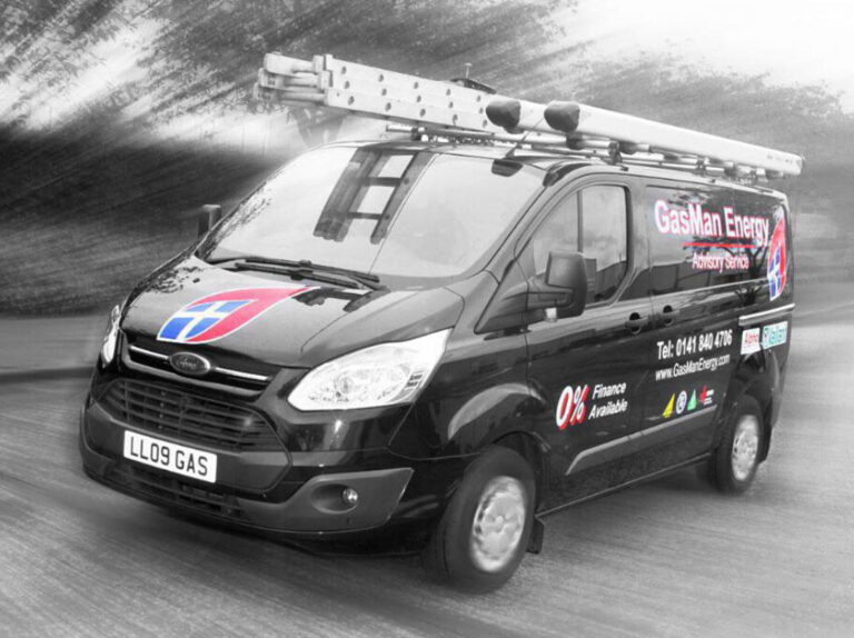 black and white image of old gasman energy van.